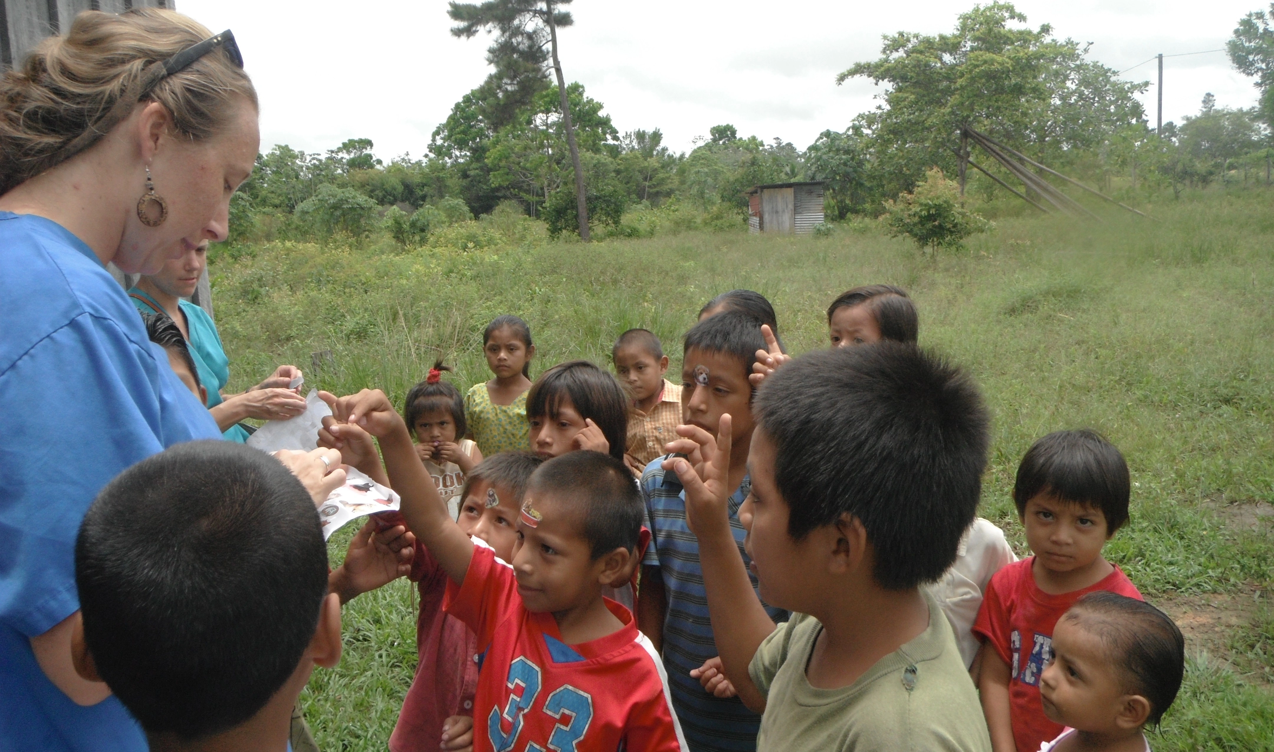 Students on a global health immersion supporting a mobile medical outreach clinic
