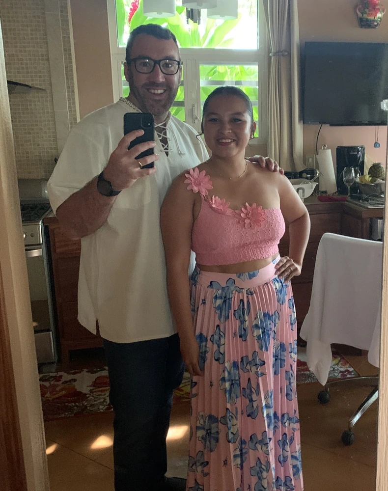 Jared and his wife dressed for an evening out at their home in Belize